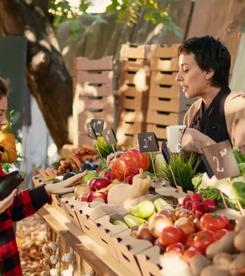 consumer-stand-holder-drinking-cup-hot-coffee-farmers-market consumer-stand-holder-drinking-cup-hot-coffee-farmers-market